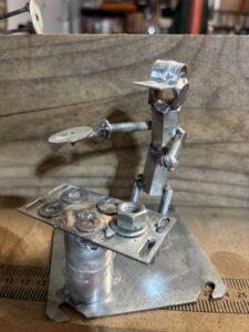 Cooking over a stove PHotograph of metal person Cooking over a stove