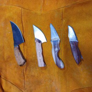 Everyday Carry knives Photograph of 4 custom-made everyday Carry knives