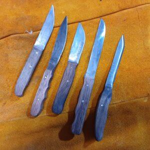 Kitchen Knives Photograph of series of custom-made Kitchen Knives of different styles and sizes
